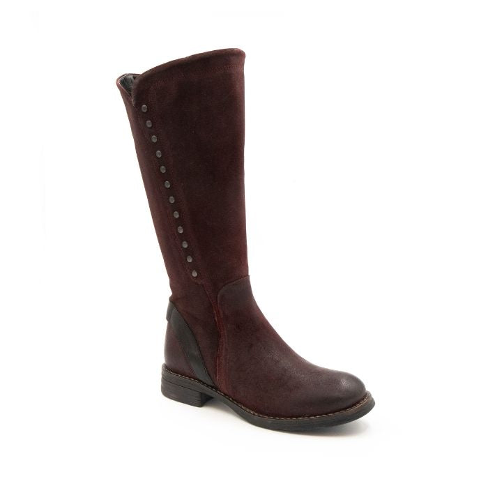 Tall burgundy leather boot with stud detailing.