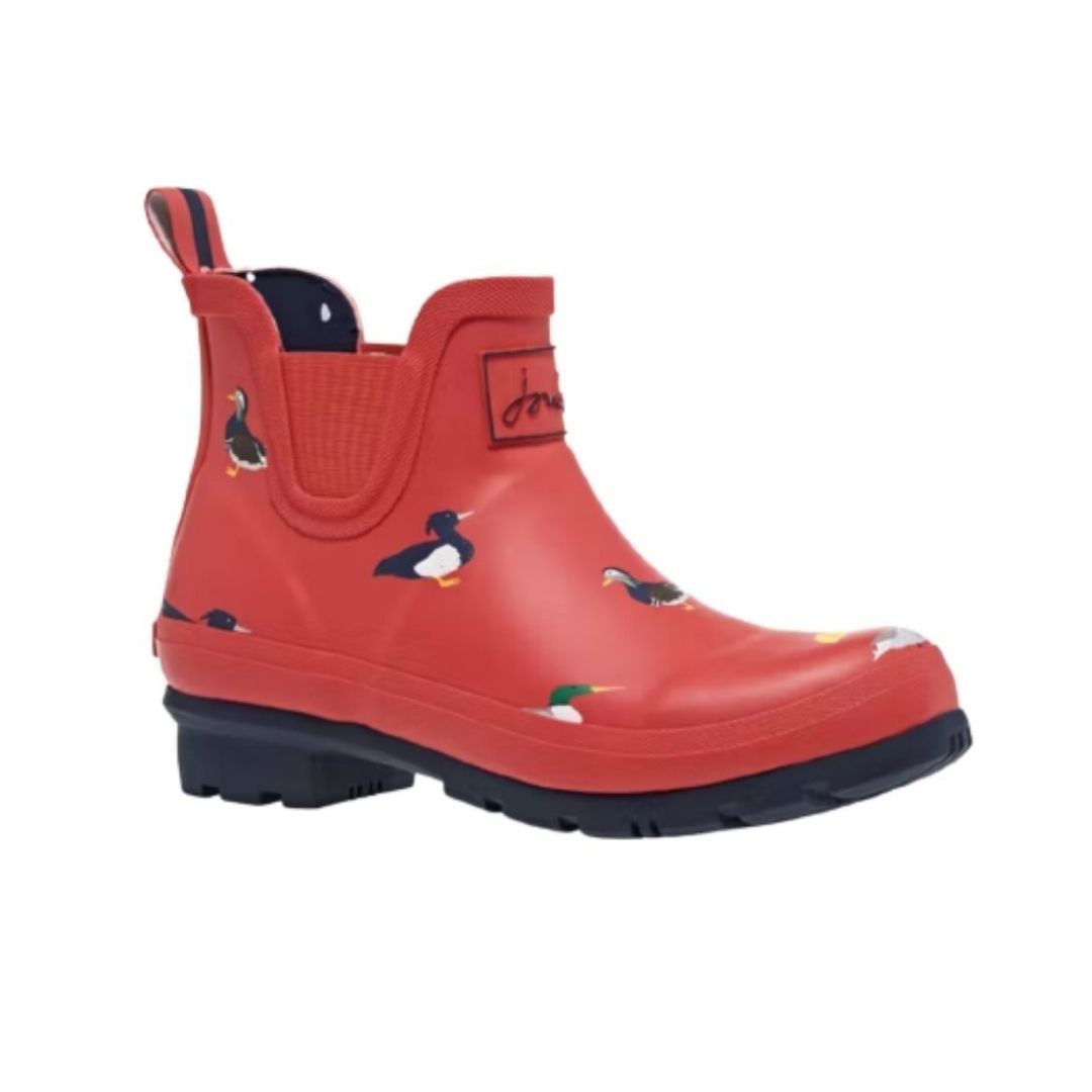 Red duck print ankle height rubber rain boot with elastic goring and heel pull tab