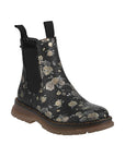 Chelsea Boot in black with white floral print faux leather, pull tabs on two sides of cuff and lugged brown outsole.